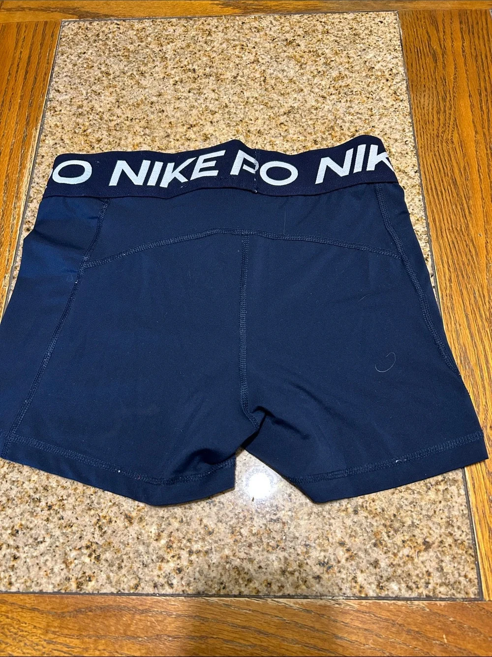 Nike Navy Athletic Compression Shorts with White Swoosh